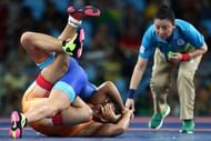 RIO DE JANEIRO, BRAZIL - AUGUST 17:  Sakshi Malik (R) of India competes against Valeriia Koblova Zholobova of Russia during a Women's Freestyle 58kg Quarterfinal bout on Day 12 of the Rio 2016 Olympic Games at Caioca Arena 2 on August 17, 2016 in Rio de Janeiro, Brazil.  (Photo by Lars Baron/Getty Images)